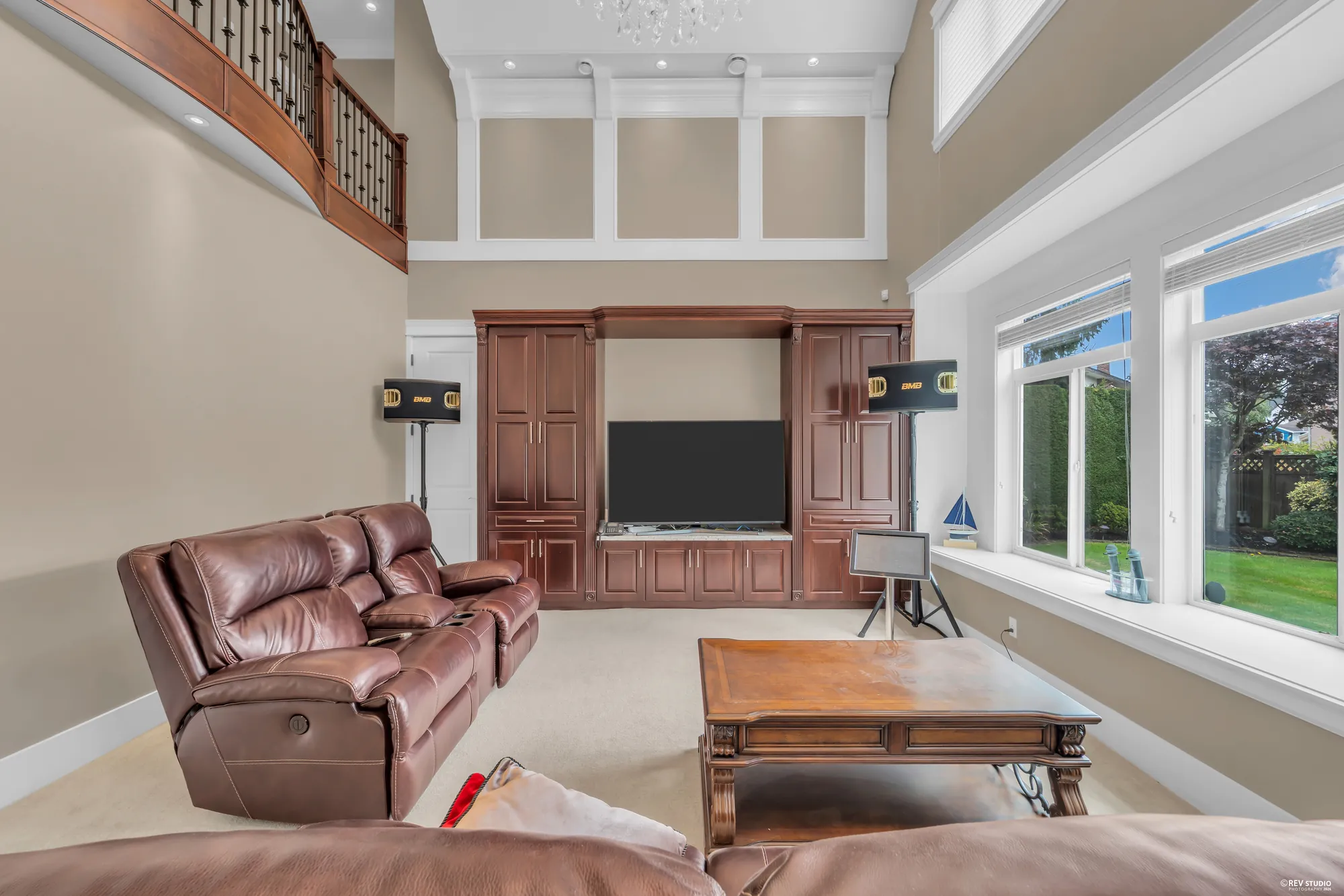 The television cabinet and the window from the other sofa