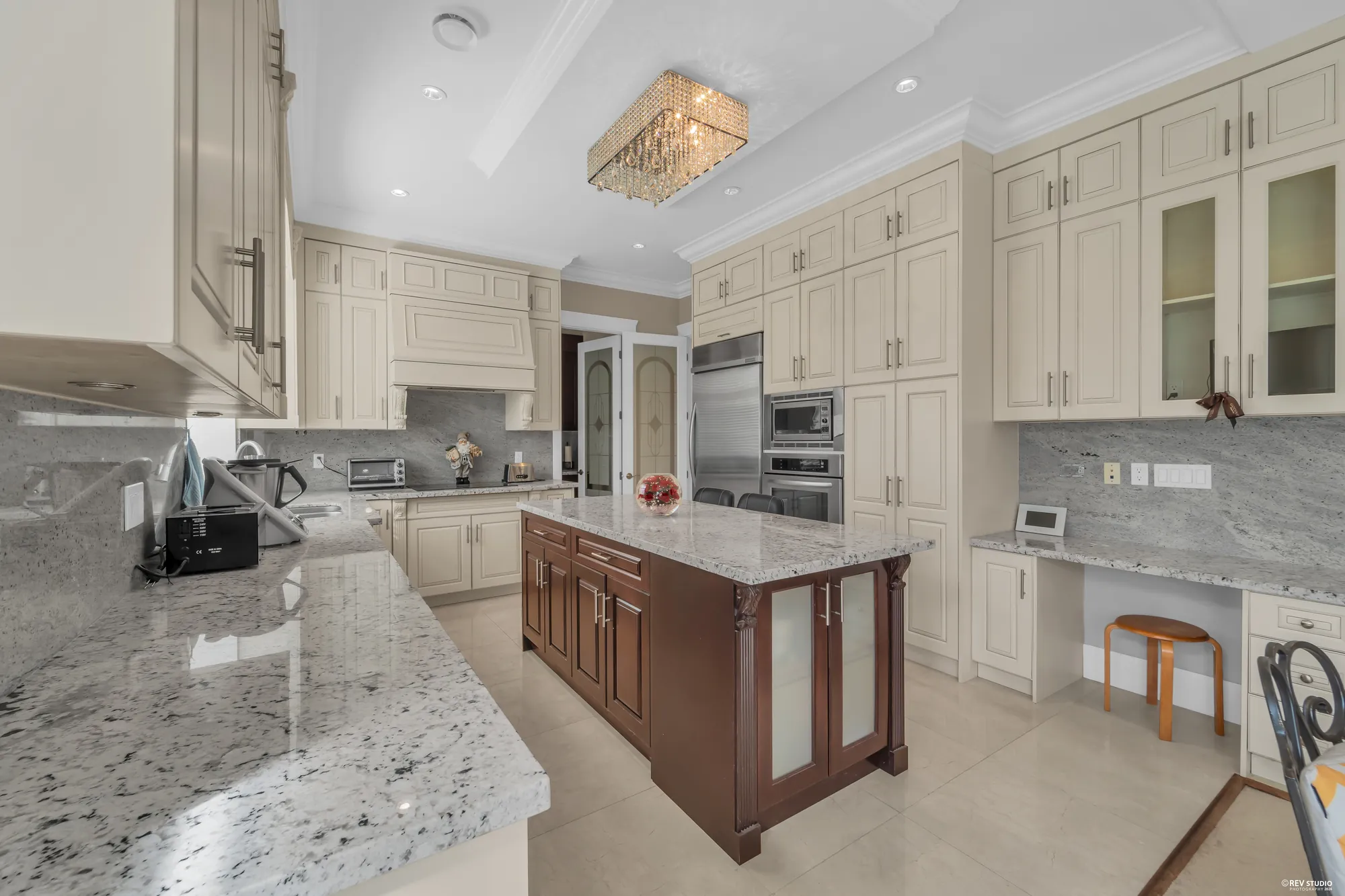 The island and the built-in desk at the end of the counter