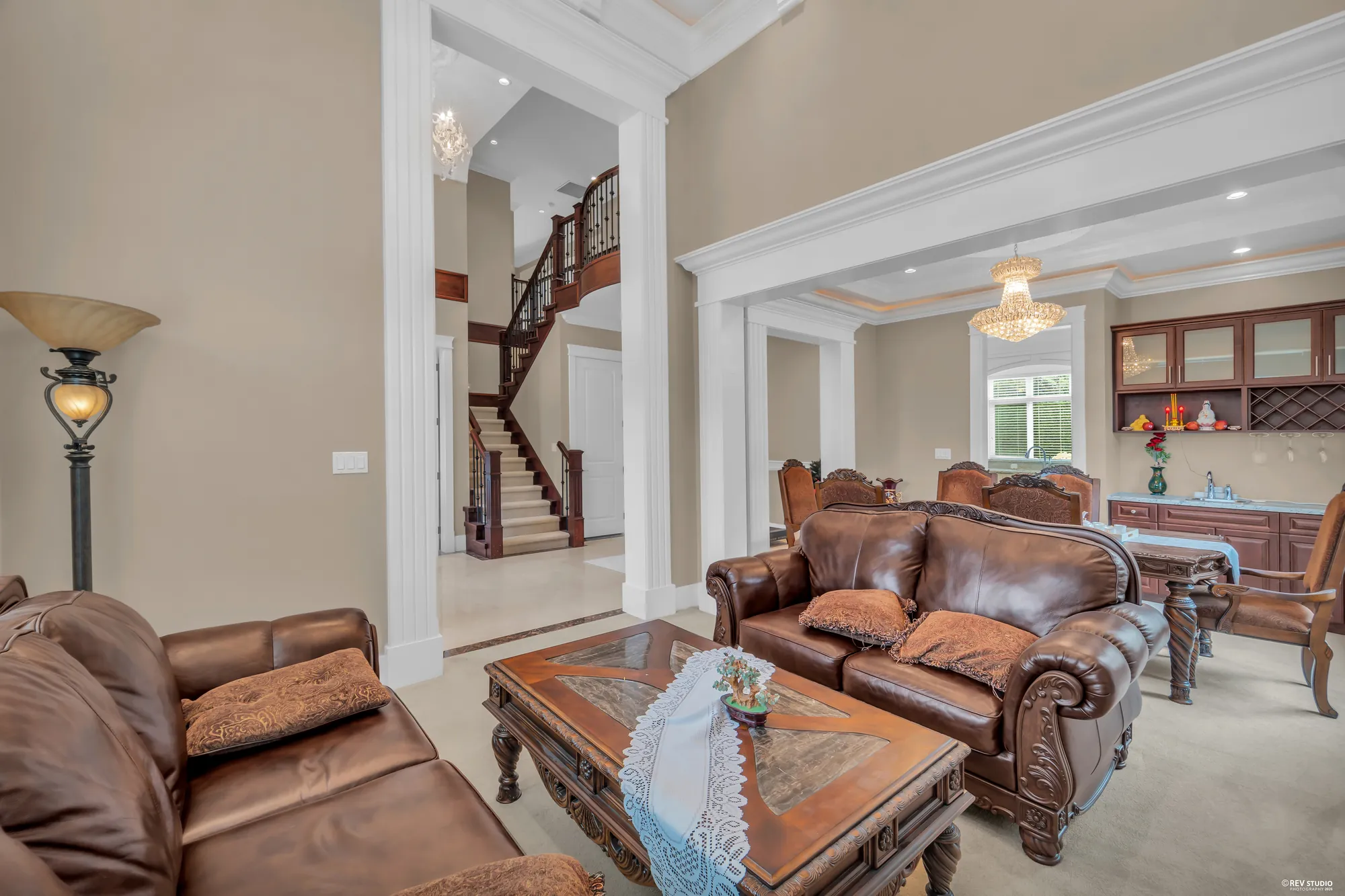 From the living room to the foyer, the stair and the dining room